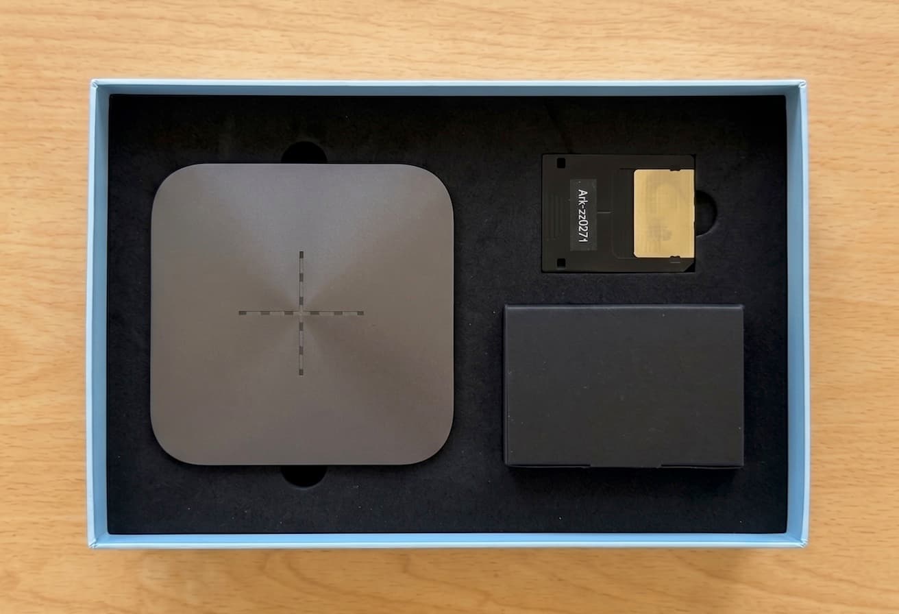 Inside the box: the Ark device, power supply, and start card